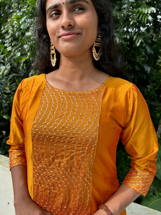 Mango yellow embroidered Vichitra silk A-line kurti top(top only)